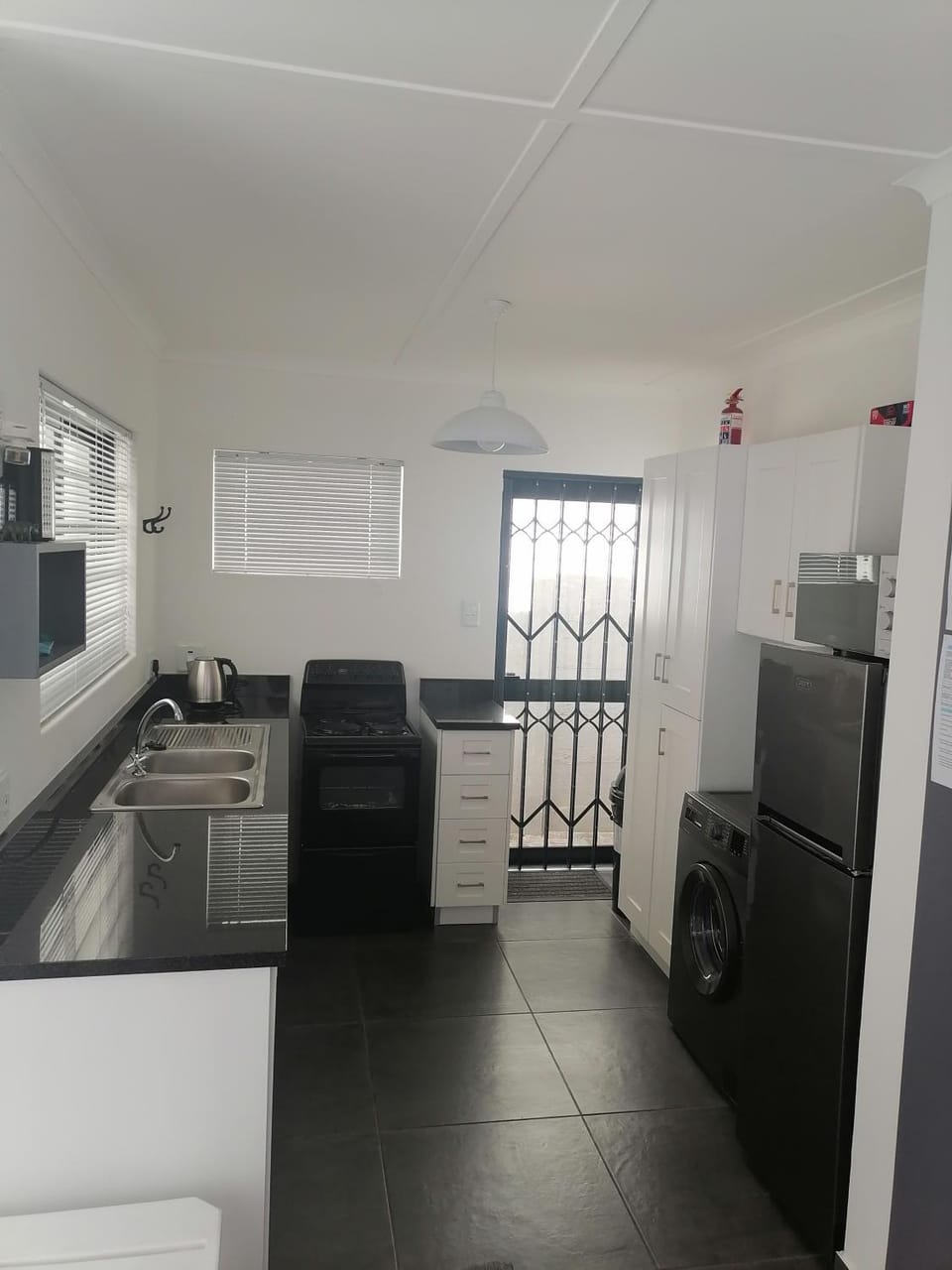 Kitchen or kitchenette, oven, stove, toaster