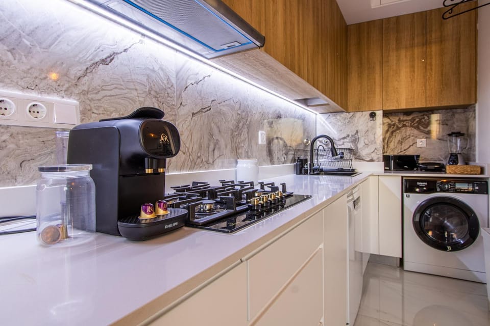 Kitchen or kitchenette, washing machine