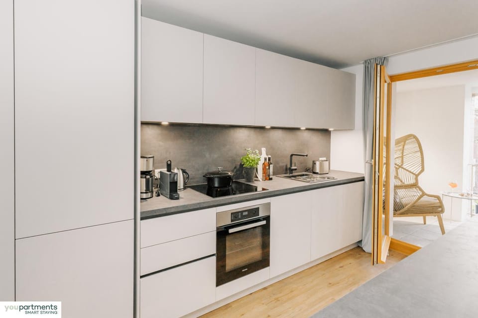 Kitchen or kitchenette, oven, stove, toaster