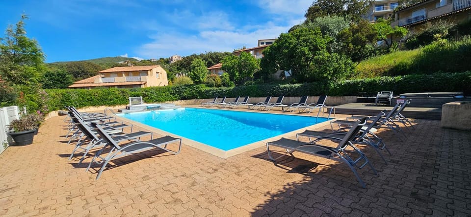 Property building, Spring, Day, Natural landscape, Pool view, Swimming pool, sunbed