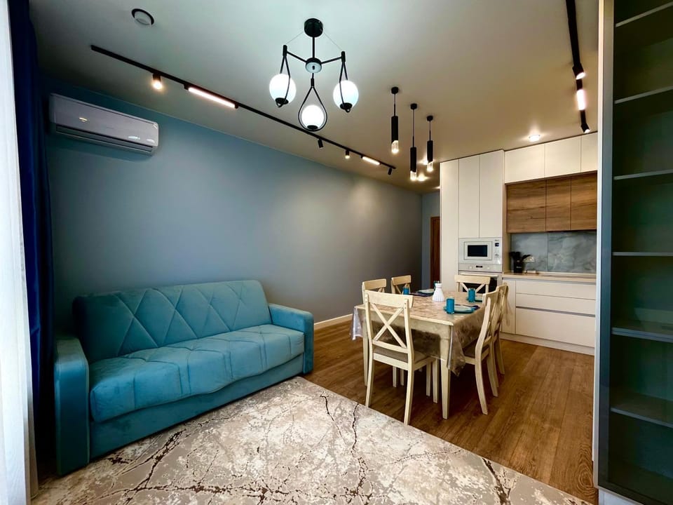 Kitchen or kitchenette, Living room, Seating area, Dining area, air conditioner