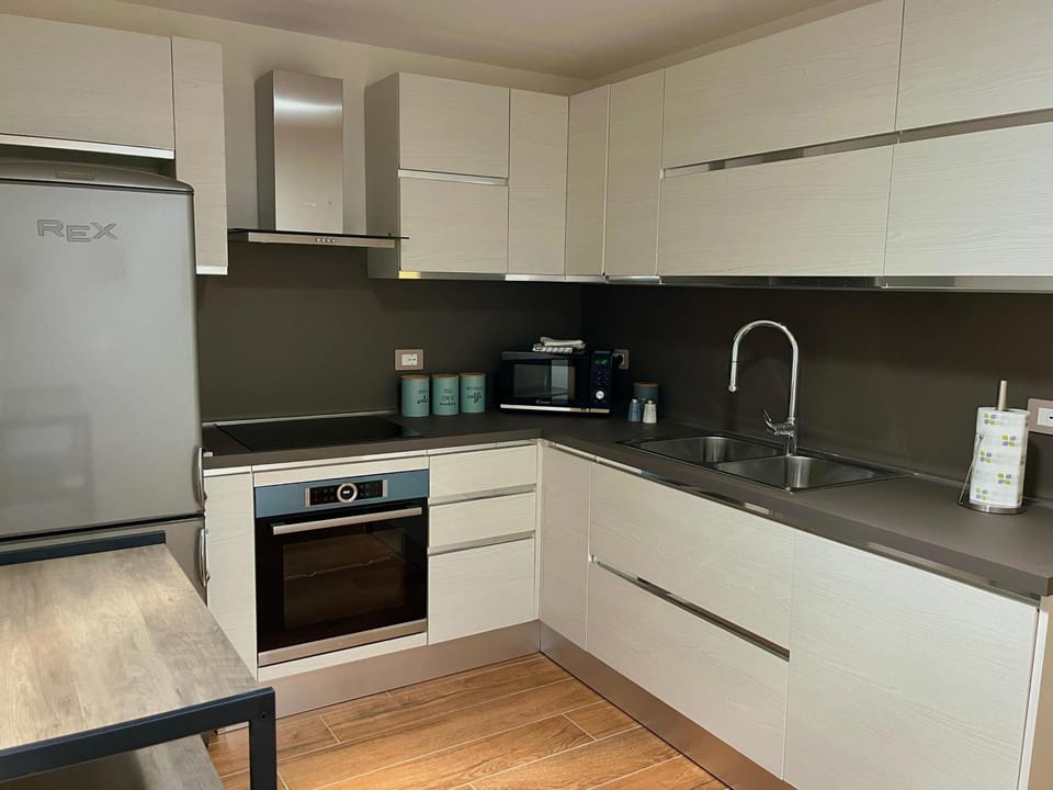 Kitchen or kitchenette, dishwasher, oven, stove, kitchen