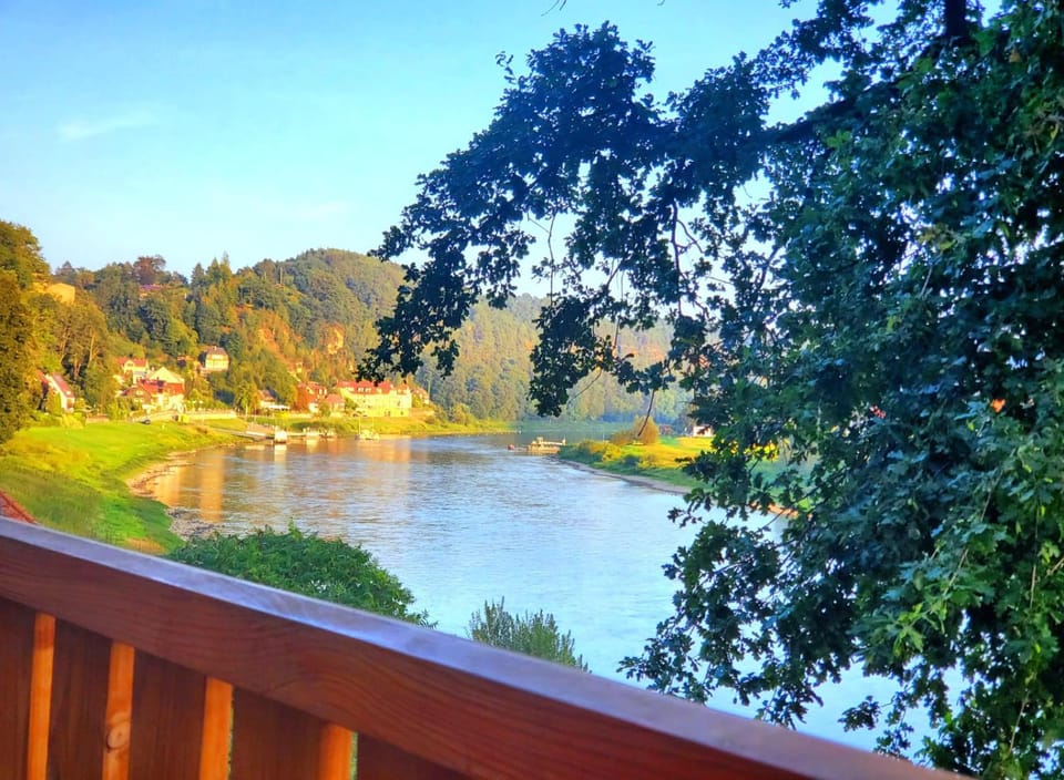 Property building, Restaurant/places to eat, Natural landscape, River view