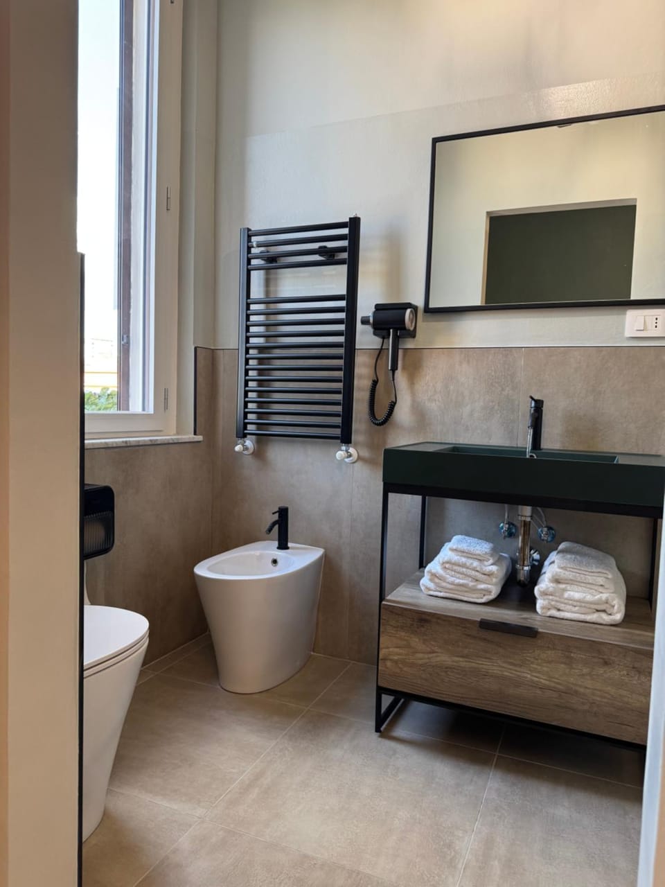 Bathroom, hair dryier, towels