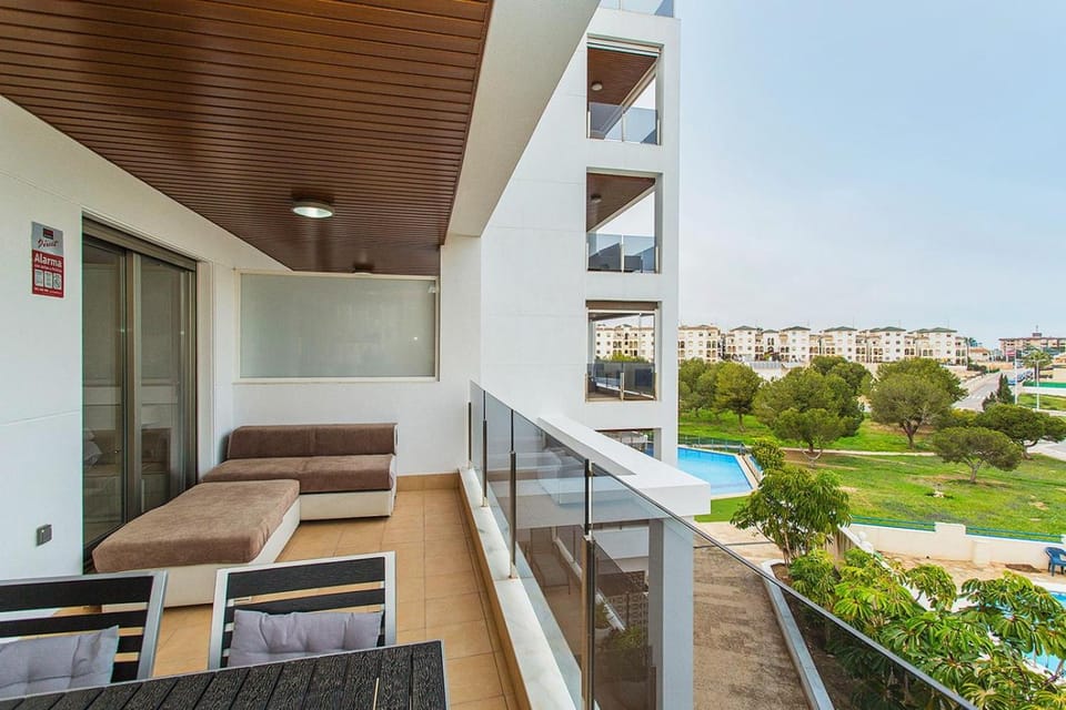 View (from property/room), Balcony/Terrace, Seating area, Pool view