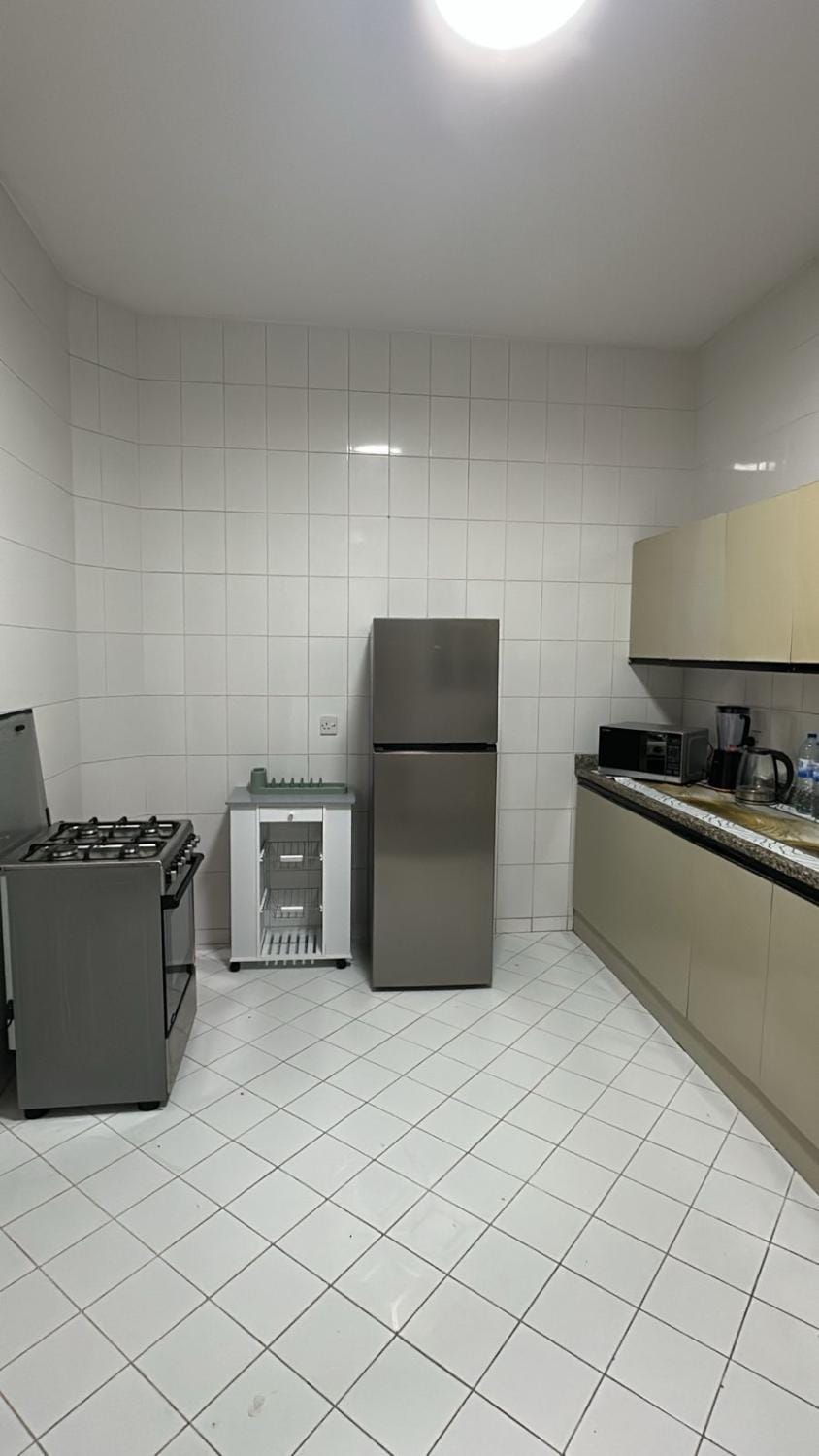 Kitchen or kitchenette, microwave, oven, stove, kitchen