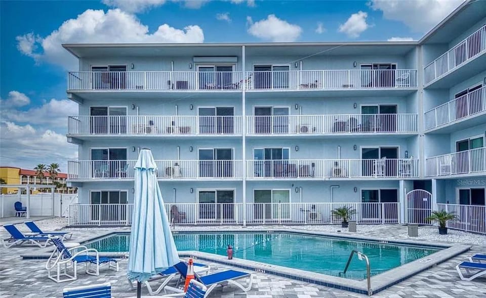 Property building, Patio, Swimming pool