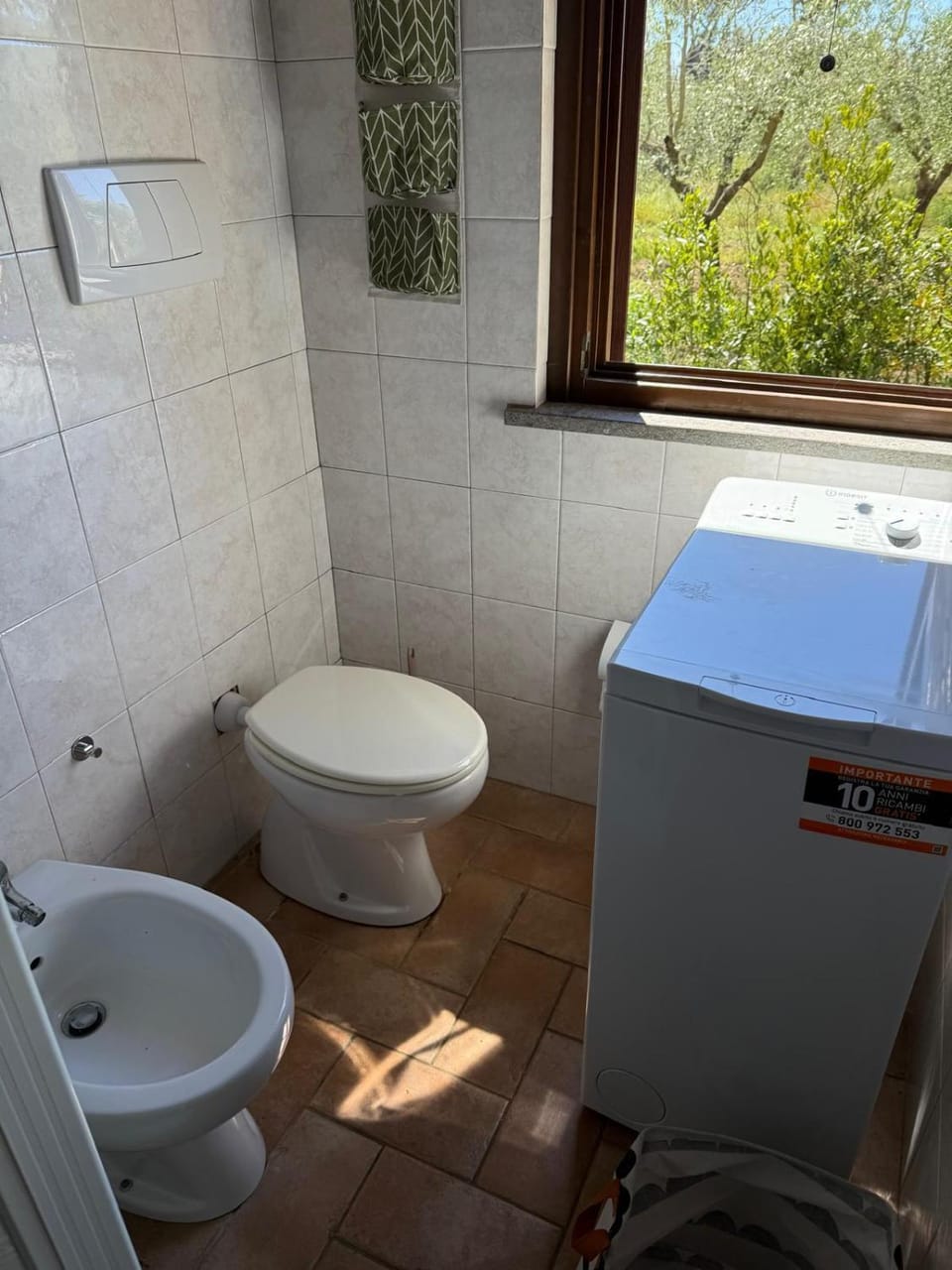 Bathroom, bidet, washing machine