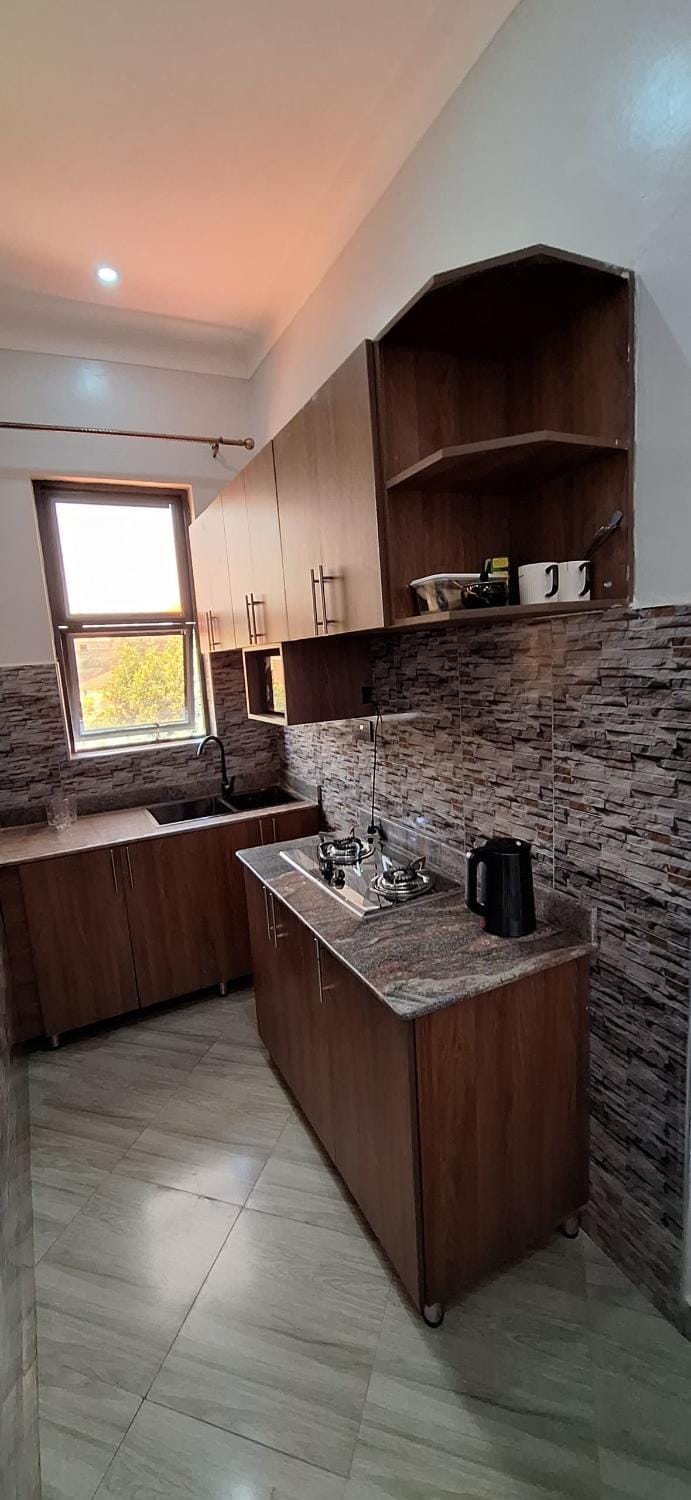 Kitchen or kitchenette, stove