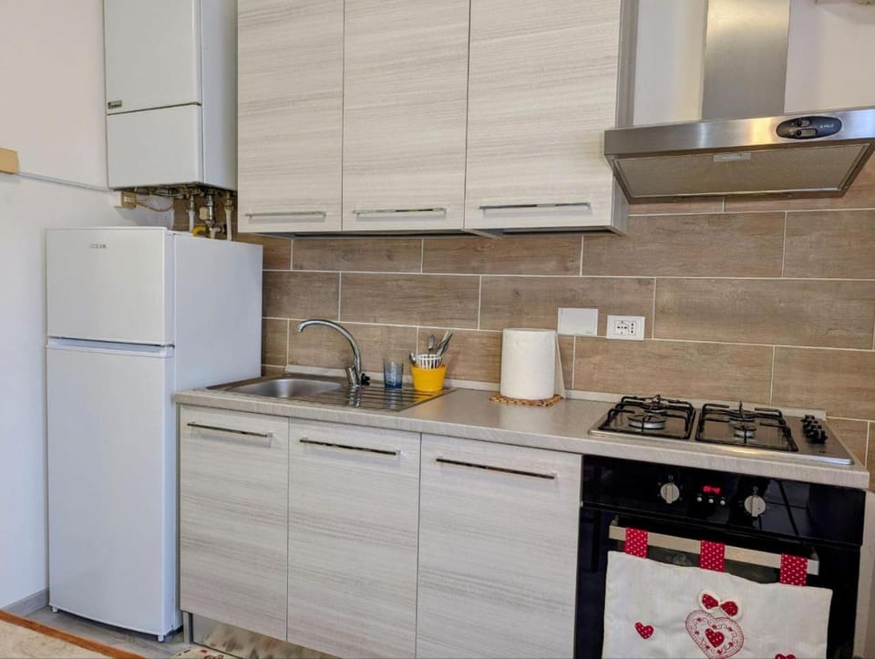 Kitchen or kitchenette, oven, stove