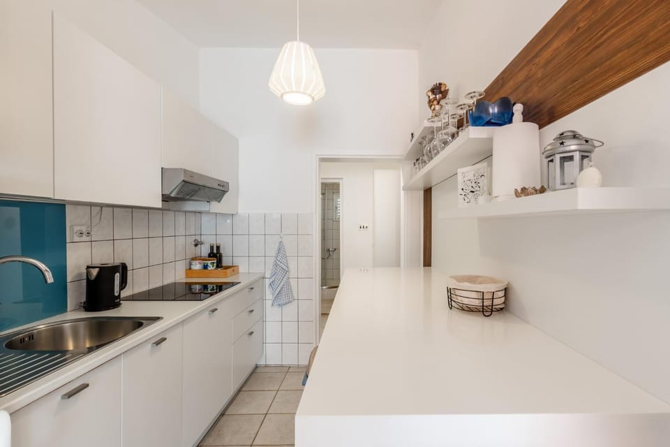 Kitchen or kitchenette, stove, toaster