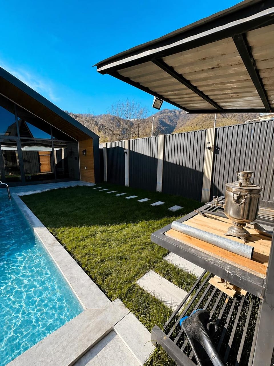 Property building, Patio, Day, Natural landscape, Mountain view, Pool view, Swimming pool