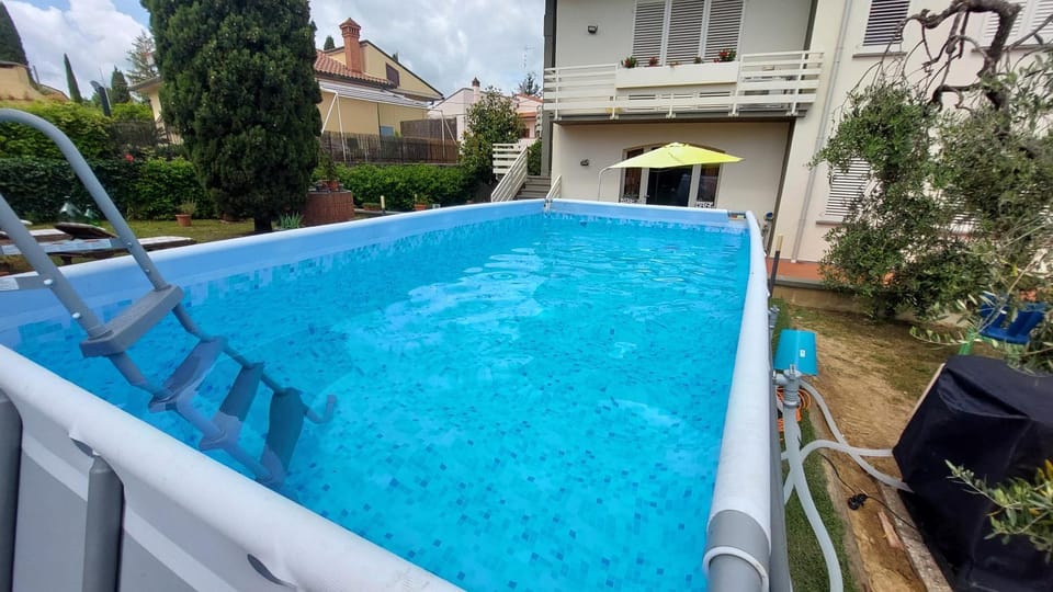 Property building, Garden, Pool view, Swimming pool, sunbed