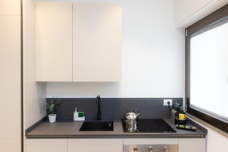 Kitchen or kitchenette, stove