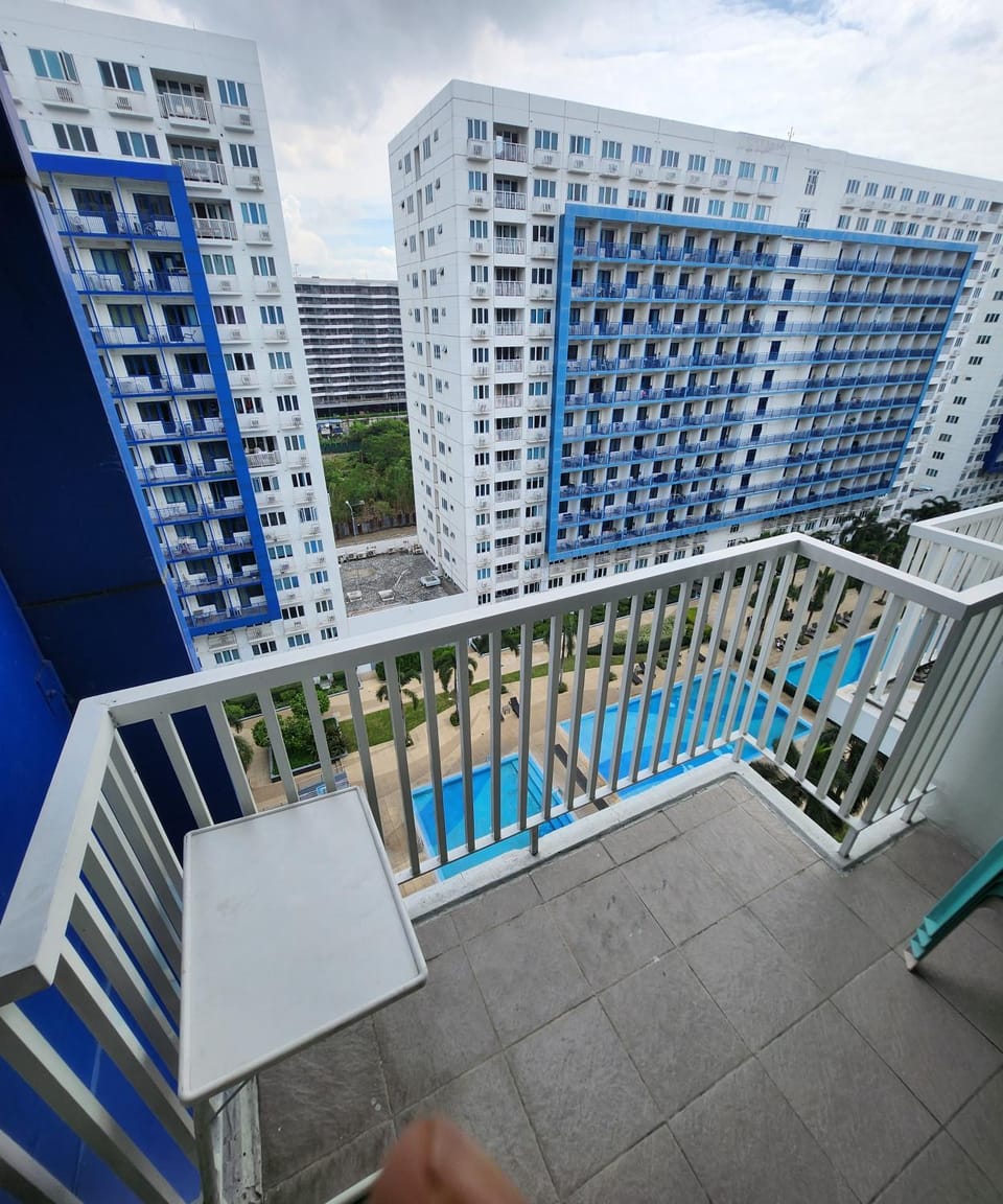 Property building, Patio, Day, View (from property/room), Balcony/Terrace, Balcony/Terrace, Pool view, Swimming pool