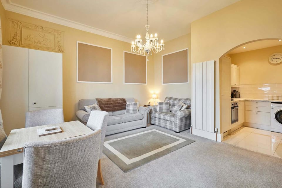 Kitchen or kitchenette, Living room, Seating area, stove, washing machine
