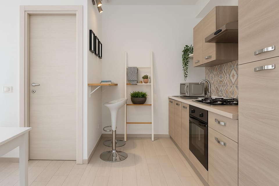 Kitchen or kitchenette, dishwasher, oven, stove