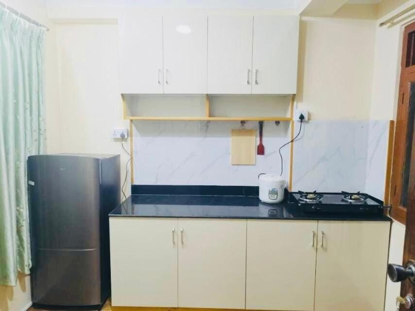 Kitchen or kitchenette, stove