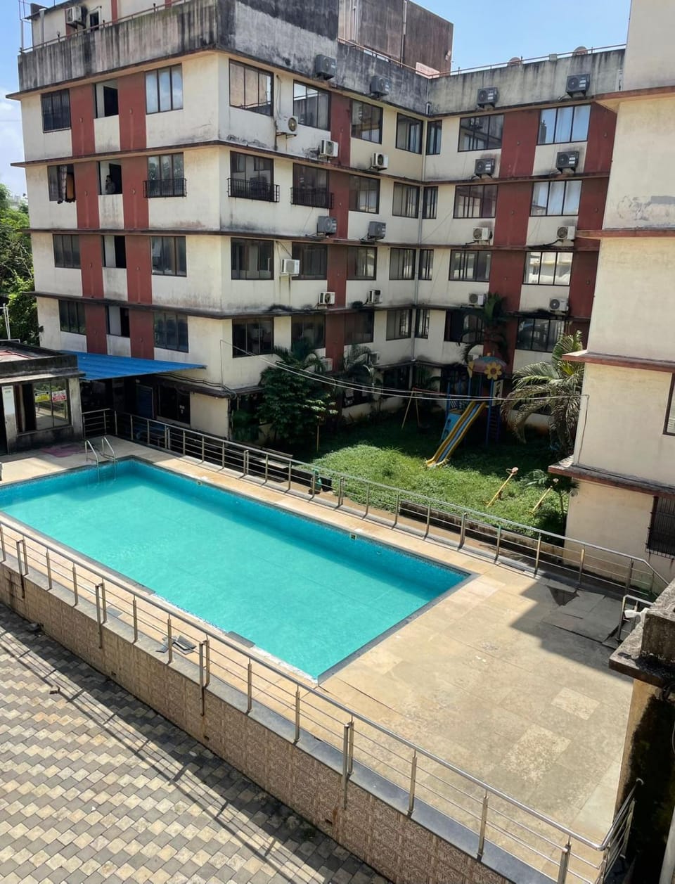 Property building, Day, Pool view, Swimming pool
