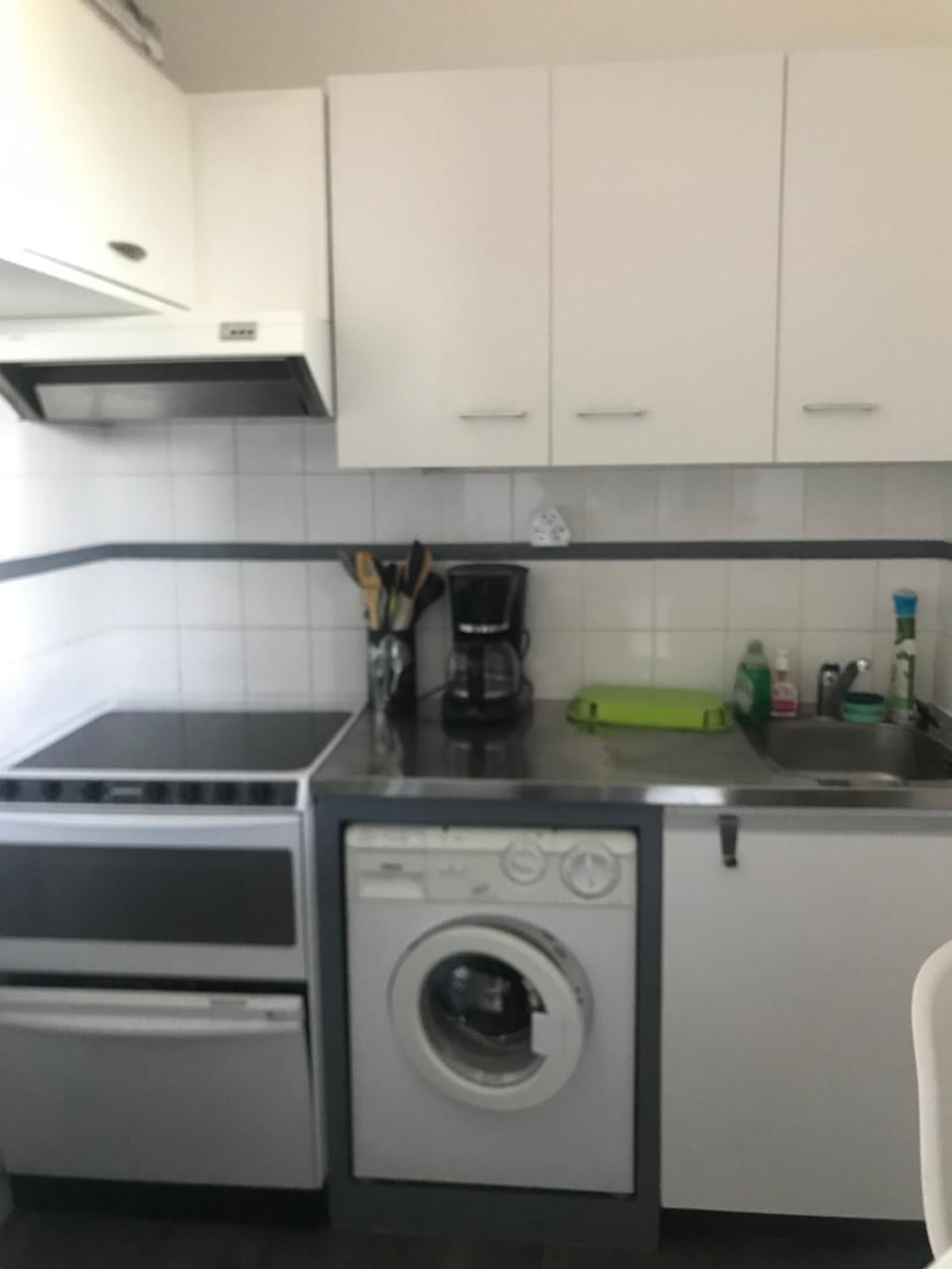 Kitchen or kitchenette, dishwasher, stove, washing machine, dryer