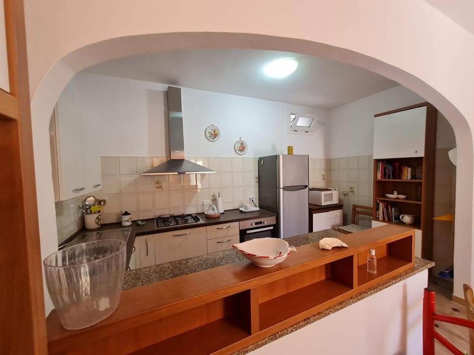 Kitchen or kitchenette, oven, stove