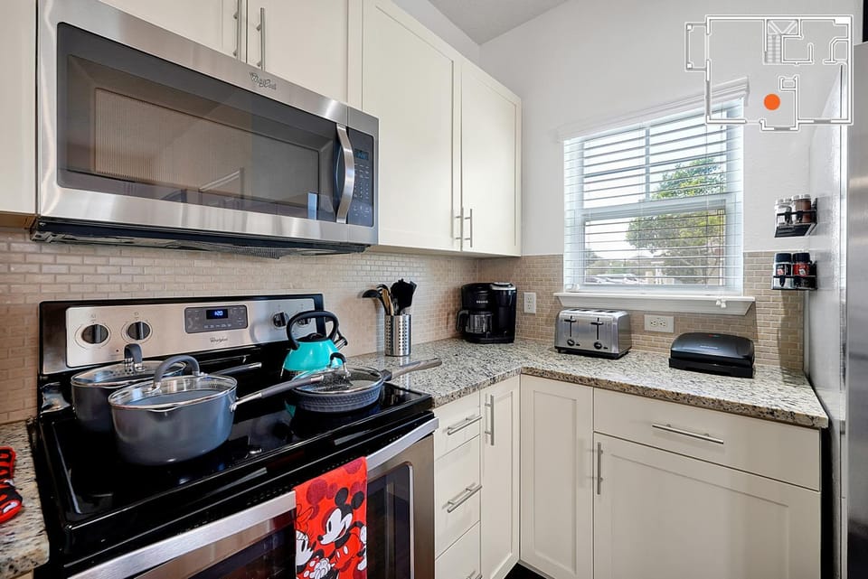 Kitchen or kitchenette, stove