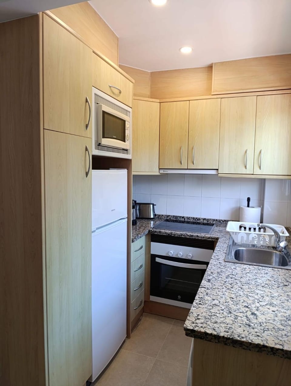 Kitchen or kitchenette, oven, stove
