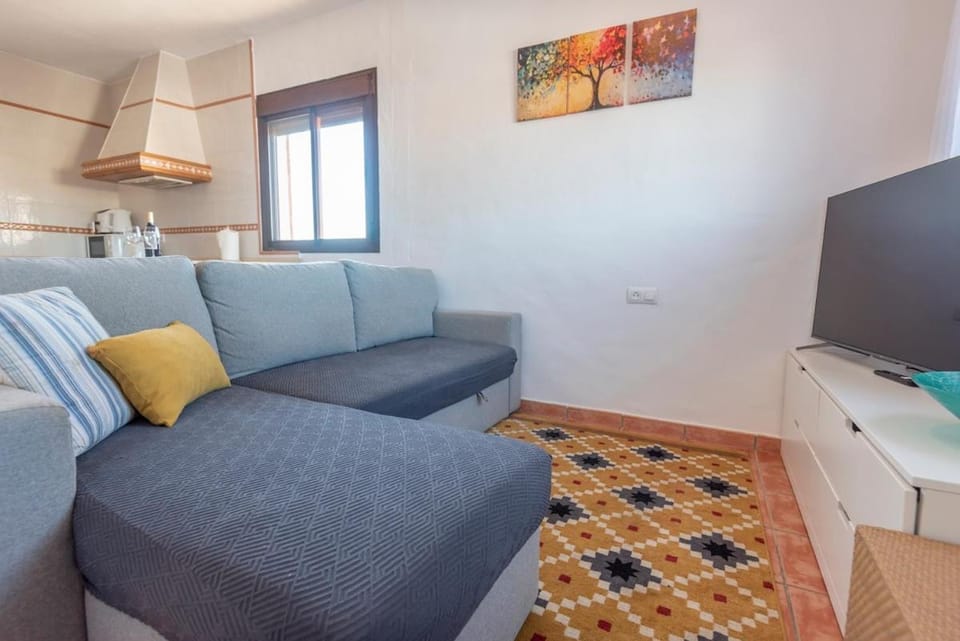Bed, TV and multimedia, Living room, Seating area