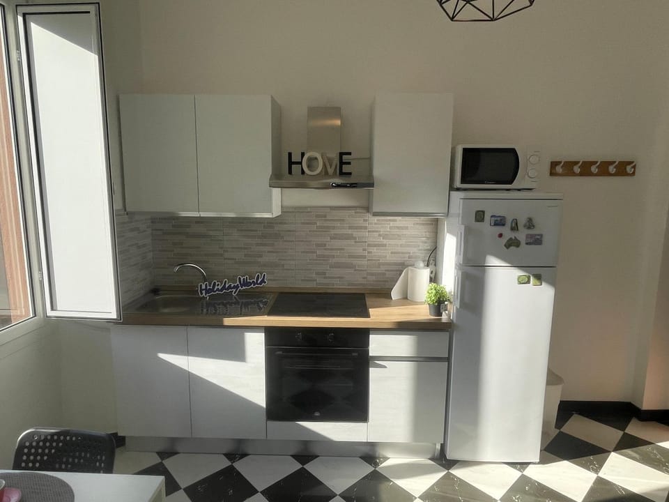 Kitchen or kitchenette, oven, stove