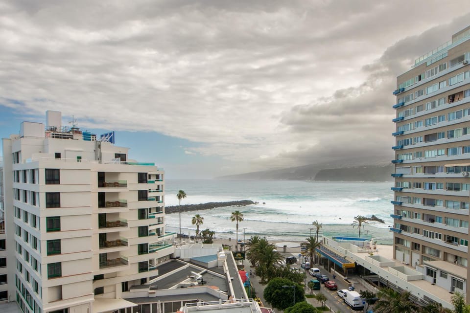 Property building, Neighbourhood, Natural landscape, Beach, City view, Sea view