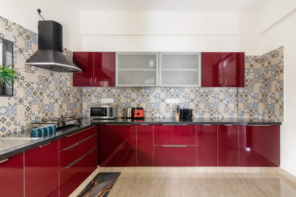 Kitchen or kitchenette, microwave, stove, toaster, kitchen