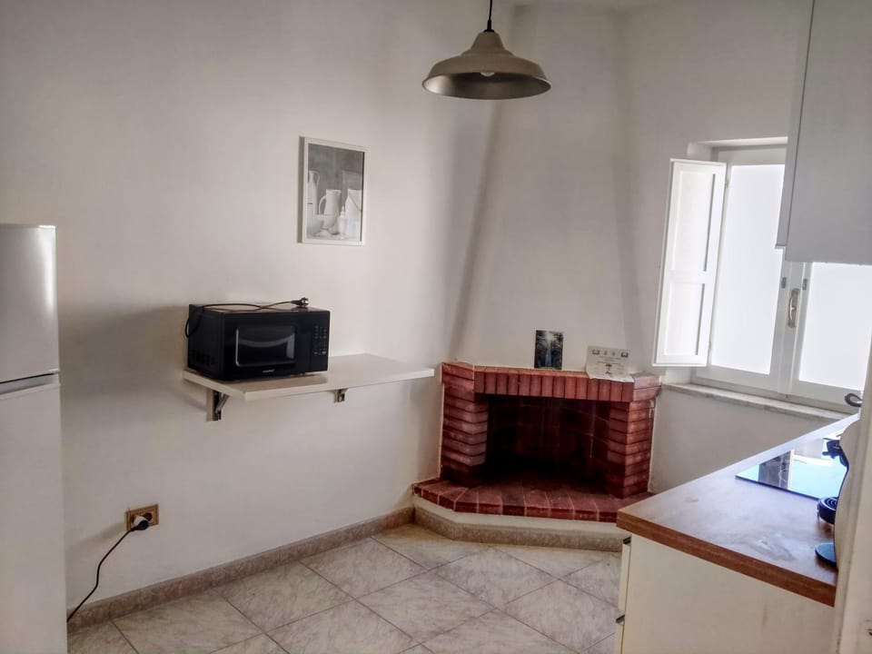 Kitchen or kitchenette, oven