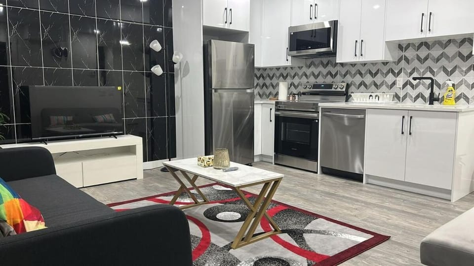 Kitchen or kitchenette, dishwasher, oven, stove