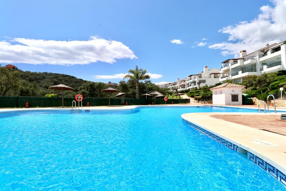 Property building, Nearby landmark, Day, Natural landscape, Mountain view, Pool view, Swimming pool, sunbed