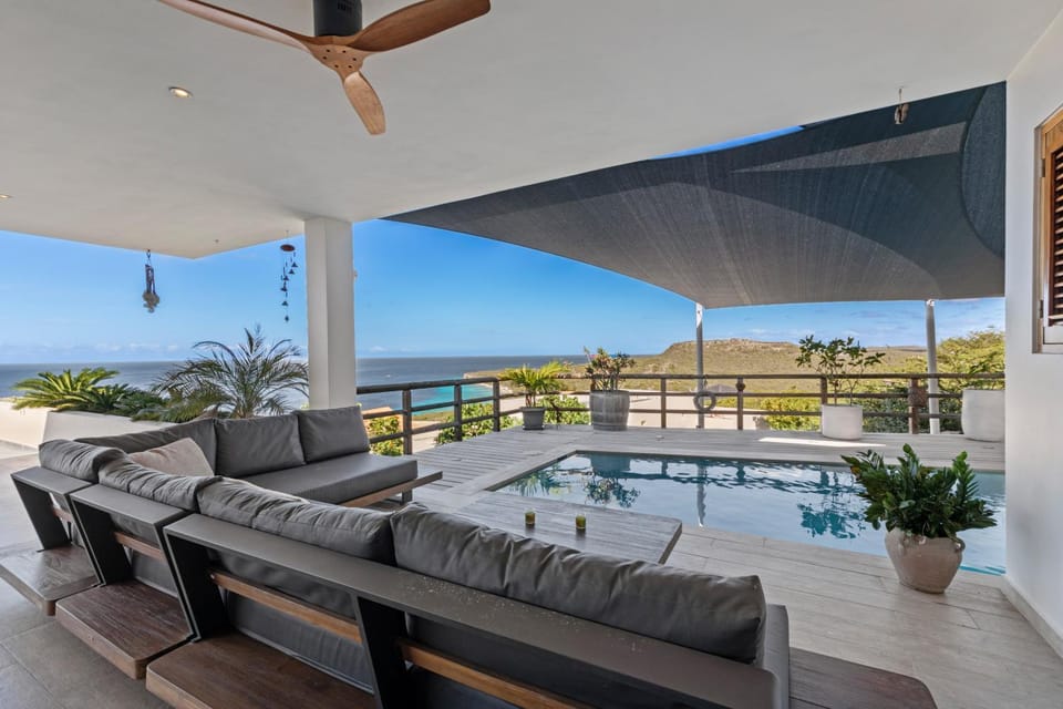 Day, Natural landscape, View (from property/room), Balcony/Terrace, Living room, Seating area, Pool view, Sea view, Swimming pool