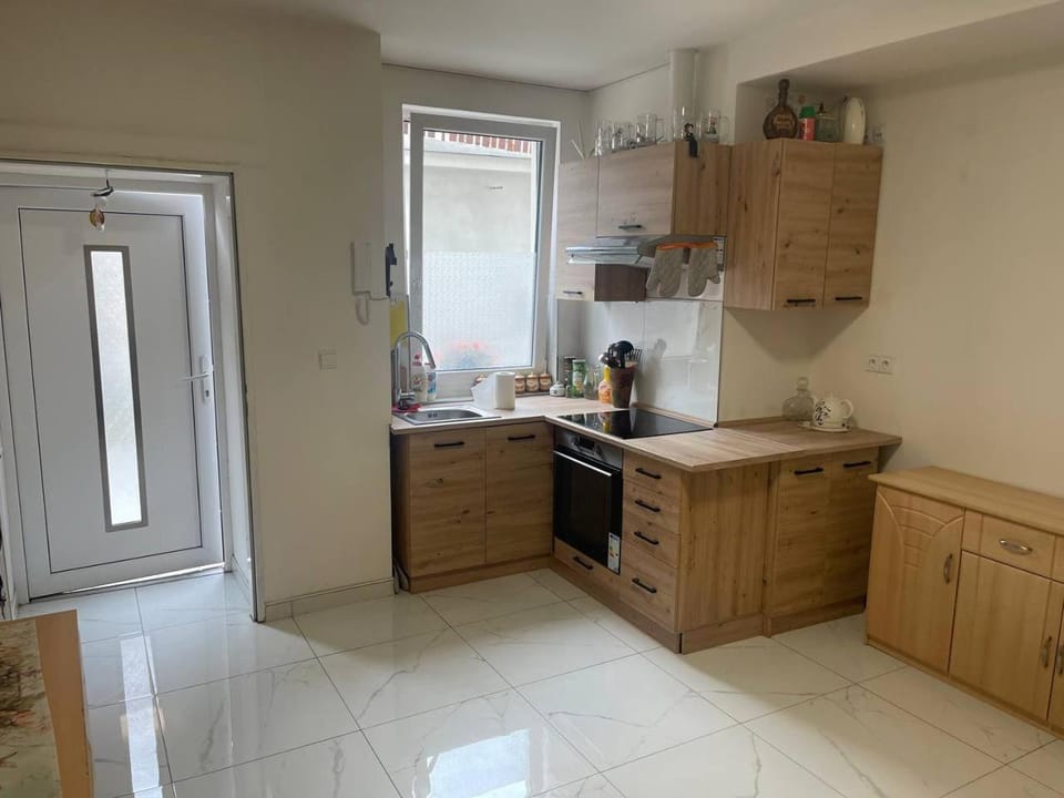 Facade/entrance, Kitchen or kitchenette, dishwasher, stove