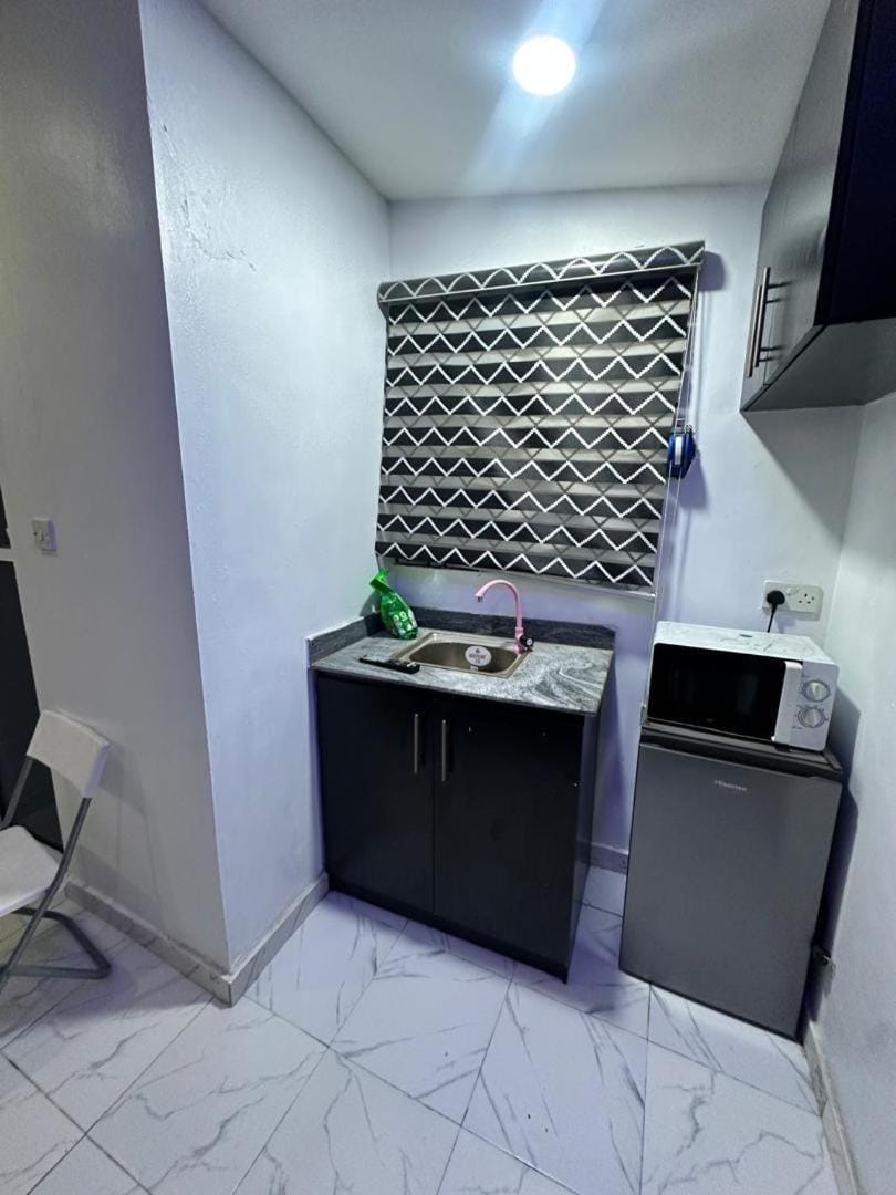 Serviced Self Contained Room At Aquaview estate Ogudu, 15 mins to the Airport Apartment in Lagos
