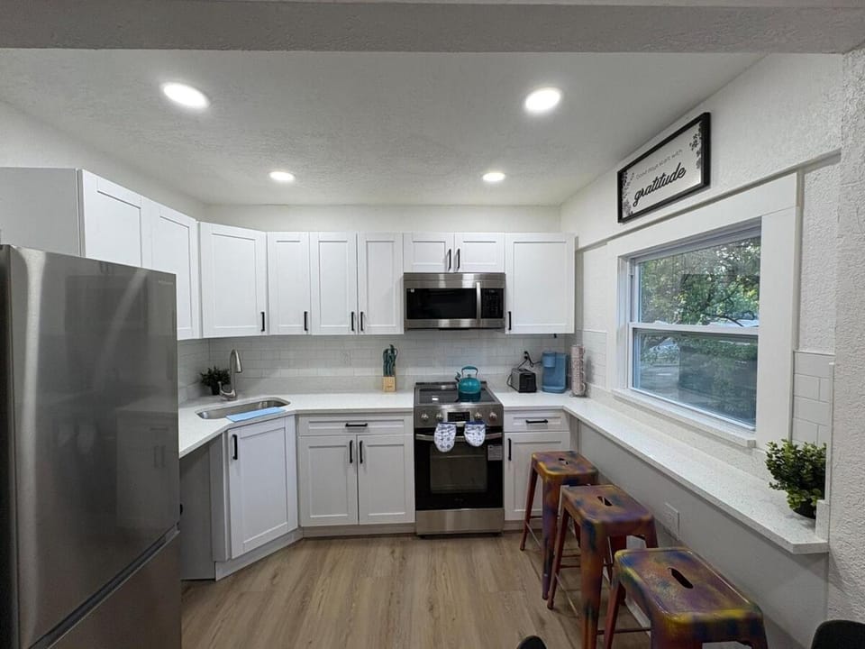 Kitchen or kitchenette, Dining area, dishwasher, oven, stove, toaster
