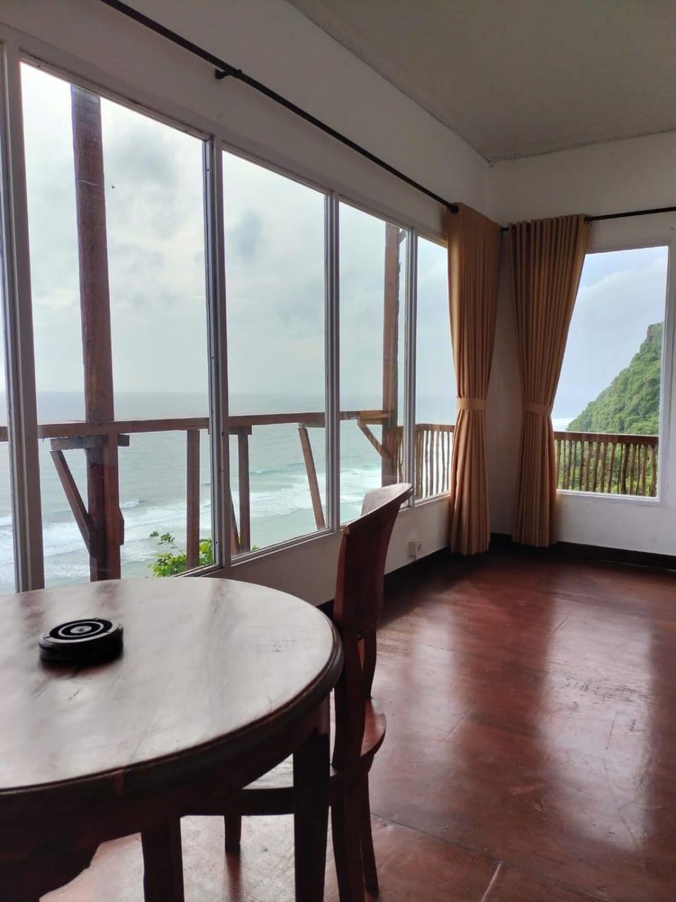 Natural landscape, View (from property/room), Living room, Seating area, Dining area, Sea view