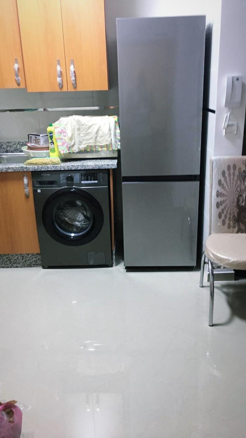 Kitchen or kitchenette, dishwasher, oven, washing machine