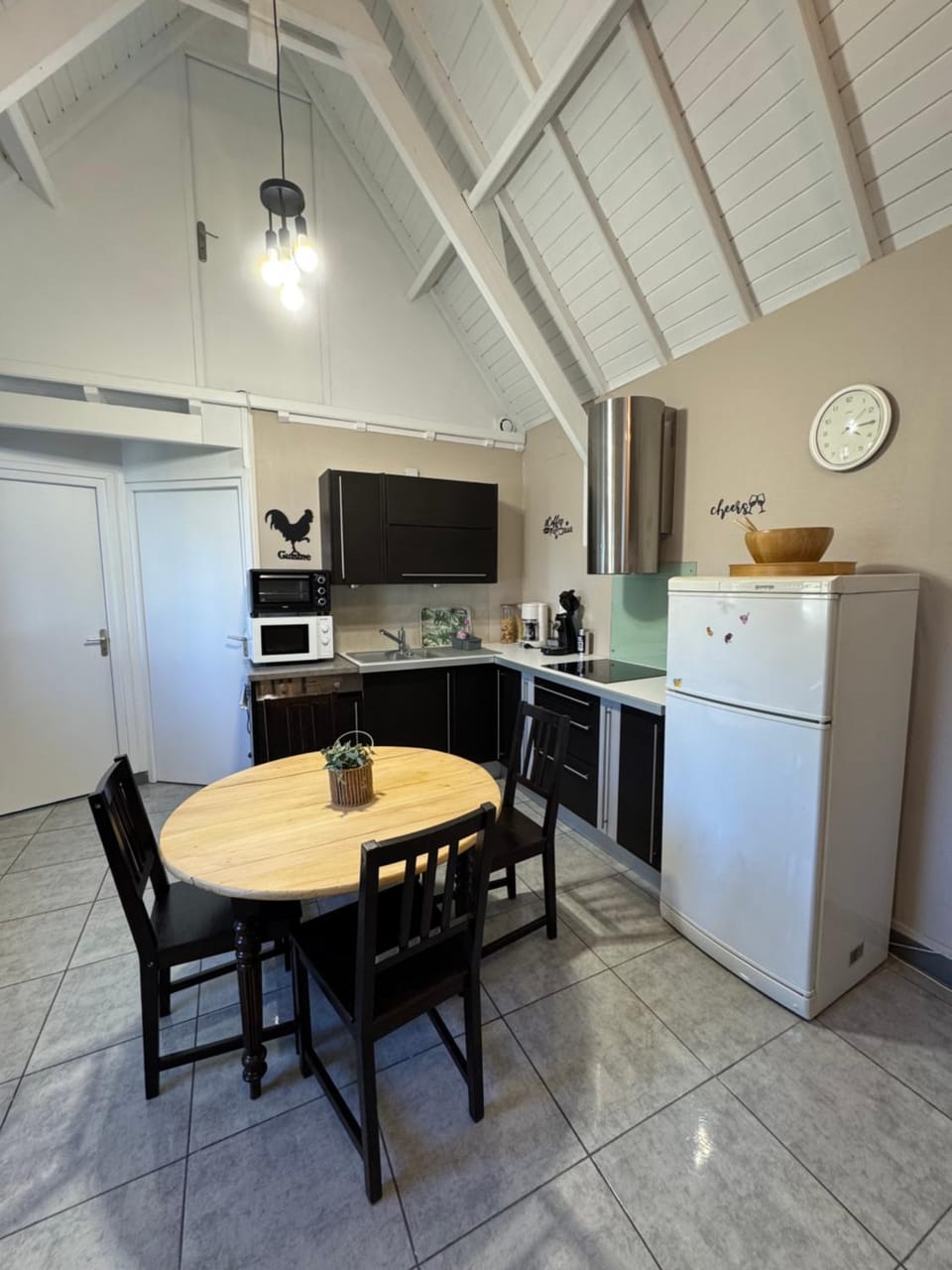 Kitchen or kitchenette, dishwasher, oven, stove, toaster