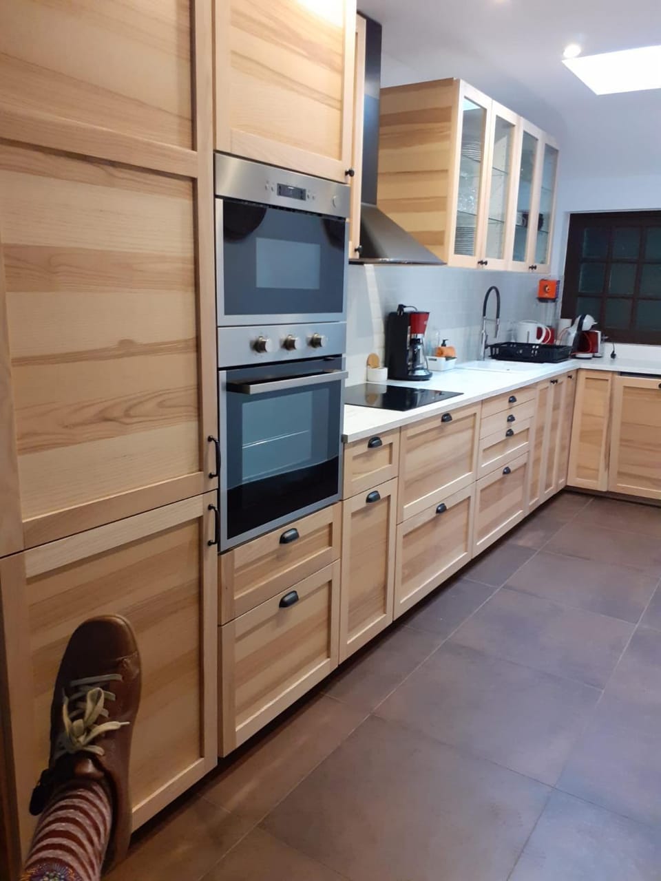 Kitchen or kitchenette, dishwasher, oven, stove