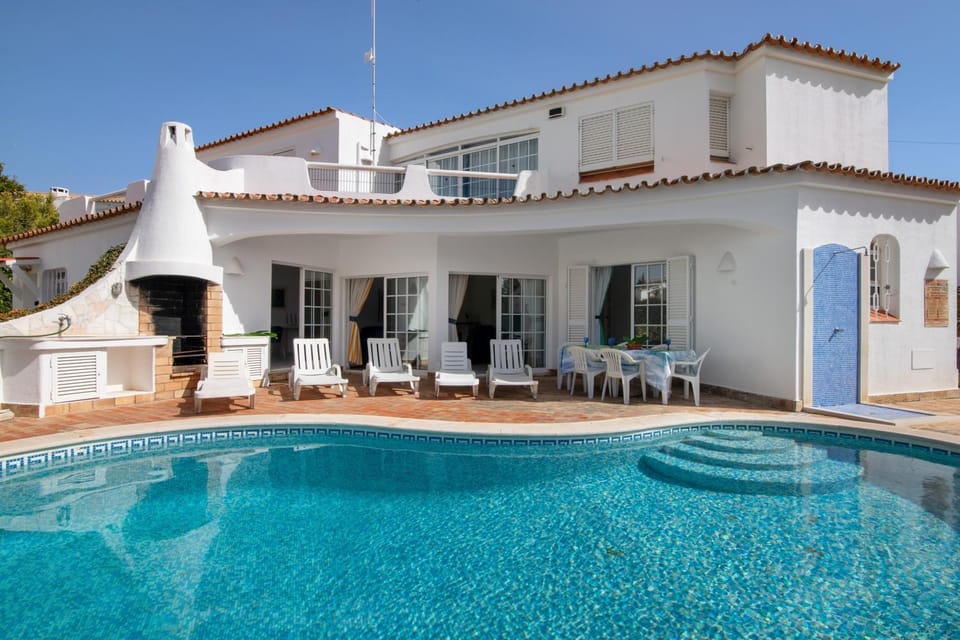 Property building, Living room, Swimming pool
