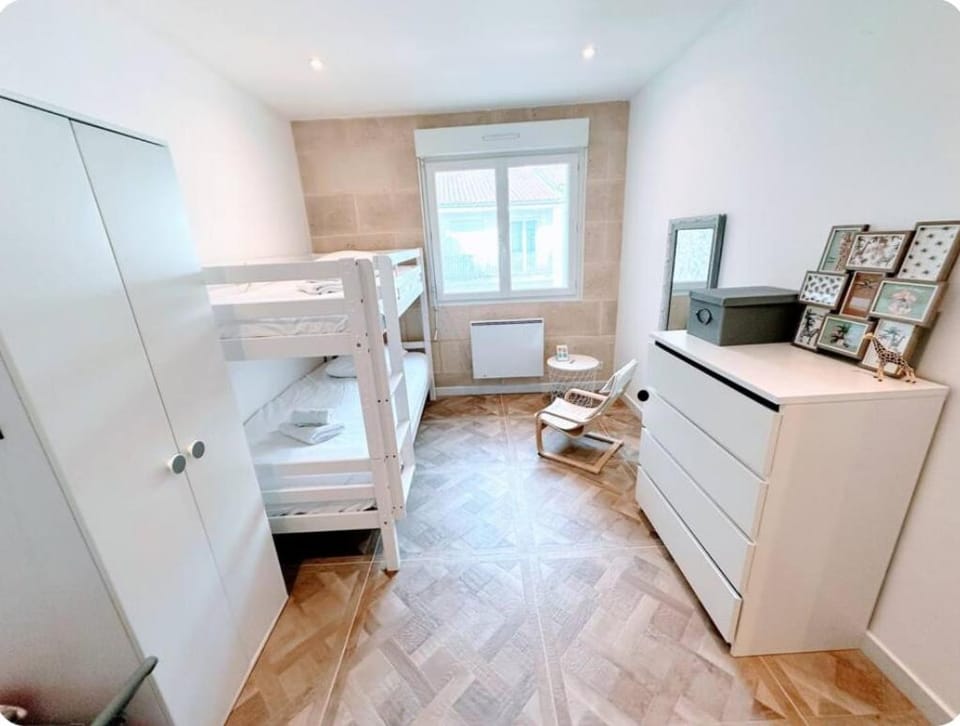 Bedroom, bunk bed, towels, wardrobe