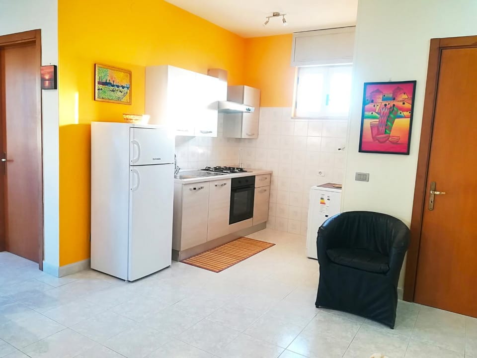 Kitchen or kitchenette, oven, stove