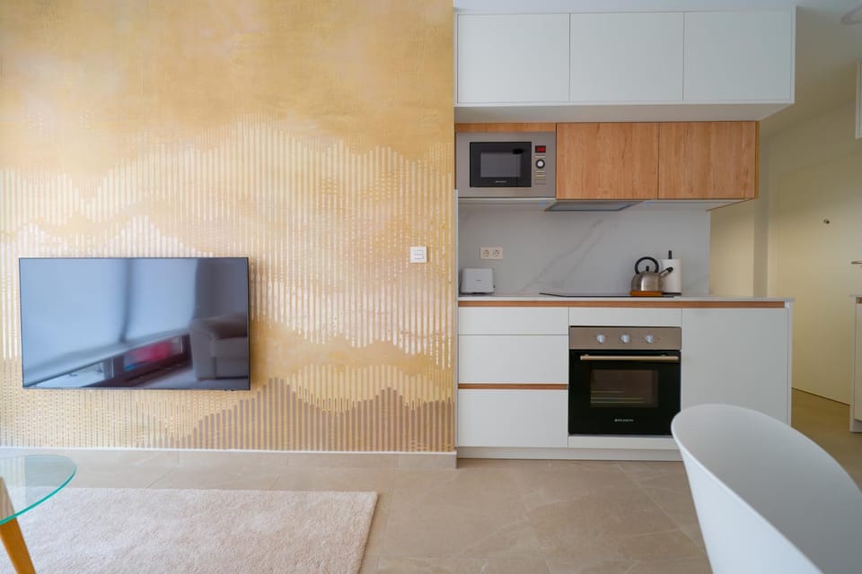 Kitchen or kitchenette, oven, stove