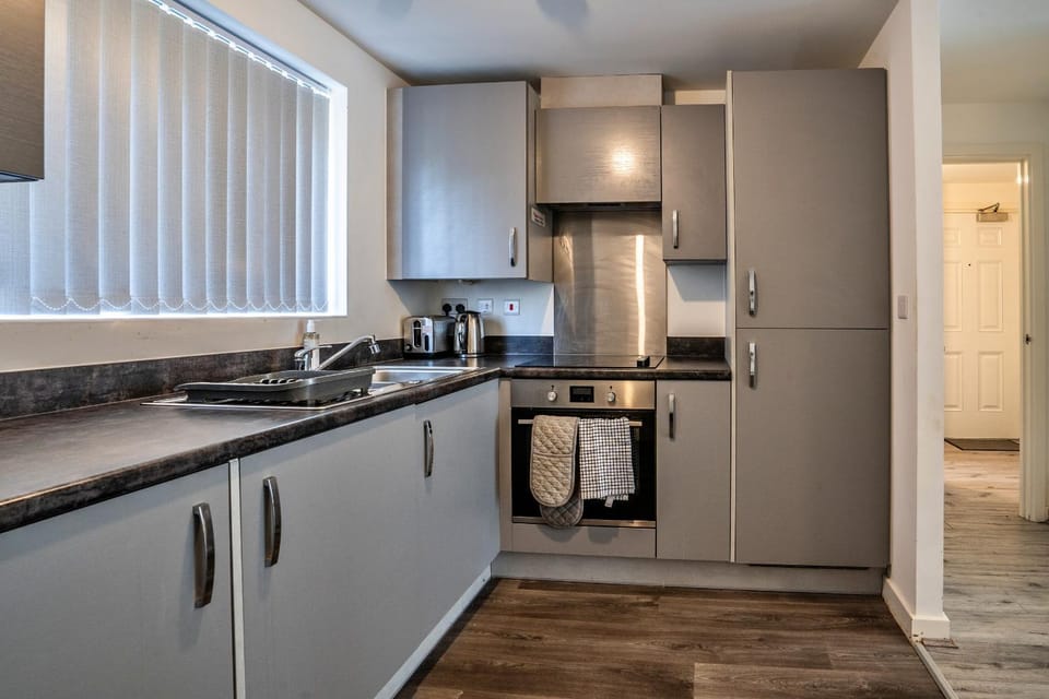 Kitchen or kitchenette, oven, toaster
