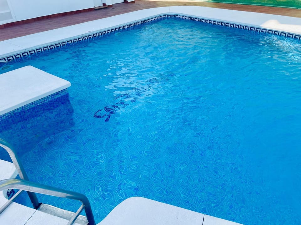 Property building, Living room, Swimming pool