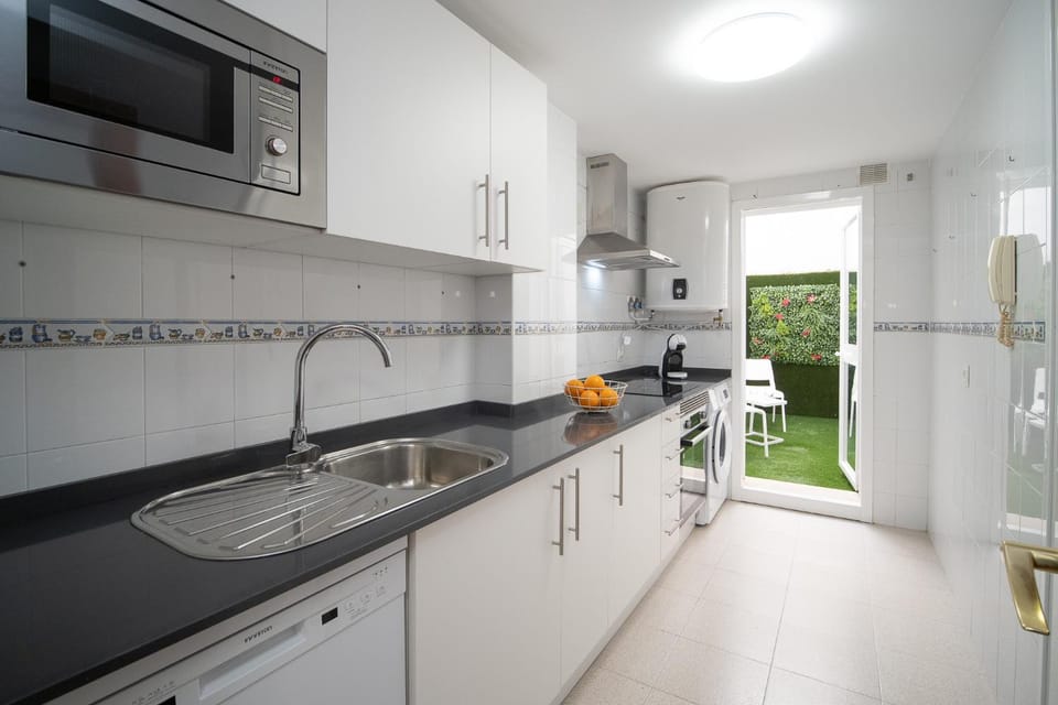 Kitchen or kitchenette, microwave, stove