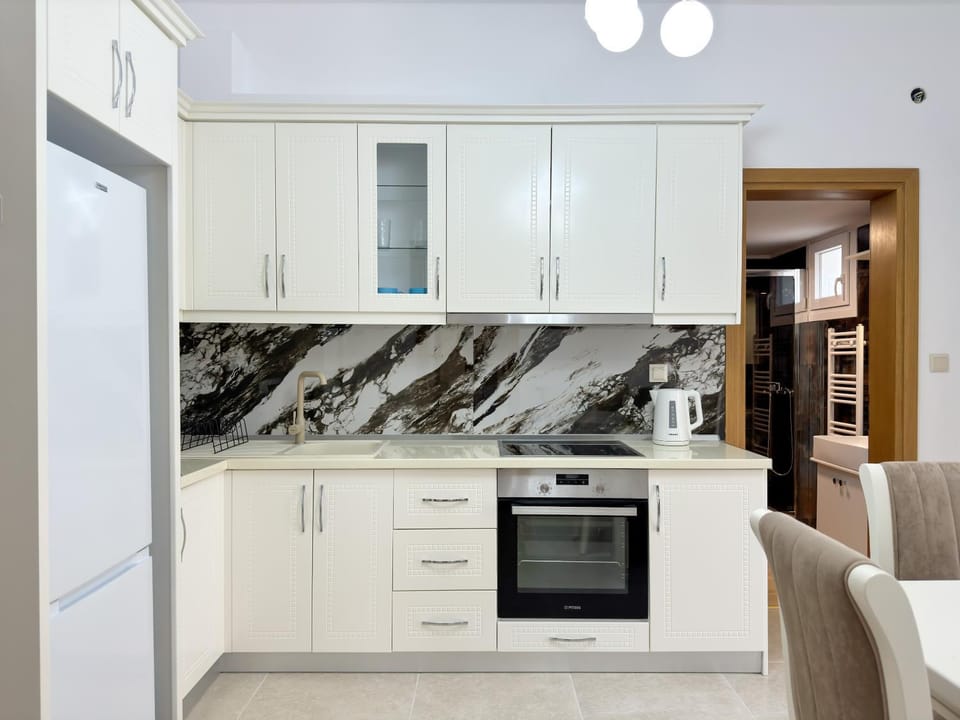 Kitchen or kitchenette, oven, stove
